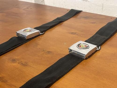 PORSCHE: Seatbelts with Porsche Crest, some rust on metal parts. [Location: Sydney]
