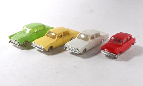 TRI-ANG MINIX: Four English made Tri-ang MINIX 1:87 HO scale model plastic cars. Austin A60, Ford Anglia, Ford Corsair models