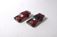 HOT WHEELS: Two 1970s Hot Wheels including 1971 Mustang Boss Hoss, red with white interior, and 1970 TNT Bird red with silver interior