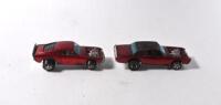HOT WHEELS: Two 1970s Hot Wheels including 1971 Mustang Boss Hoss, red with white interior, and 1970 TNT Bird red with silver interior - 2