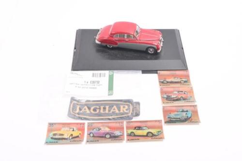 JAGUAR: A group of items mostly associated with Jaguar. 1:43 scale OXFORD DIECAST Jaguar MK 8 in Claret/Mist Grey & 'JAGUAR' sticker