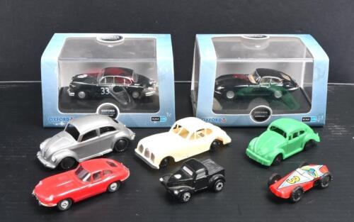 MINIATURE CARS: A group of 1:76 scale and smaller model cars. Jaguar, VW models