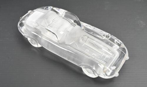 E-TYPE: A glass desk paperweight in the form of a Jaguar 'E' Type Coupe