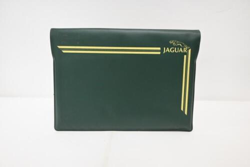 SERIES III: A superb set of 1980's American/Canadian issue green vinyl 'JAGUAR' pouch with group of Jaguar Series III Service and Driver's Handbooks. Unused Service Coupon booklet. With 'SMITHS' heater, heater blower stickers, JAGUAR 'LIFT' adhesives