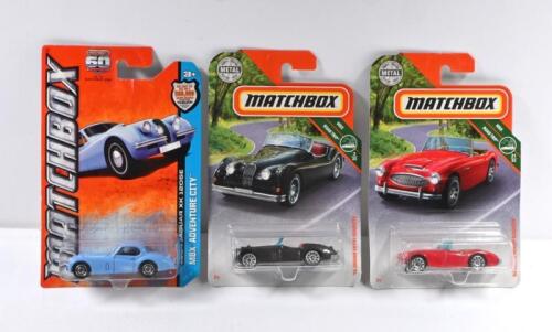 MATCHBOX: Three modern MATCHBOX models on card. Austin-Healey & Jaguar models