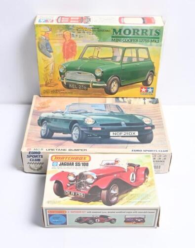 ENGLISH CARS: Three plastic model kits for English cars. AOSIMA 1/24 scale MGB URETHANE BUMPER - EURO SPORTS CLUB, MATCHBOX 1:32 scale JAGUAR SS/100 (PK-304) & TAMIYA 1/24 scale MORRIS MINI COOPER 1275S Mk.1 (KIT NO.2439)