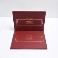 DAIMLER: A red leather 'Daimler' pouch containing Daimler and Jaguar Driver Handbooks, Maintenance Book & Service Record. 1979 'Daimler SOVEREIGN 4.2, VANDEN PLAS 4.2' (Publication Part No. AKM 4174 Edition 2), and 1980 'Daimler DOUBLE SIX 5.3, VANDEN PLA - 2