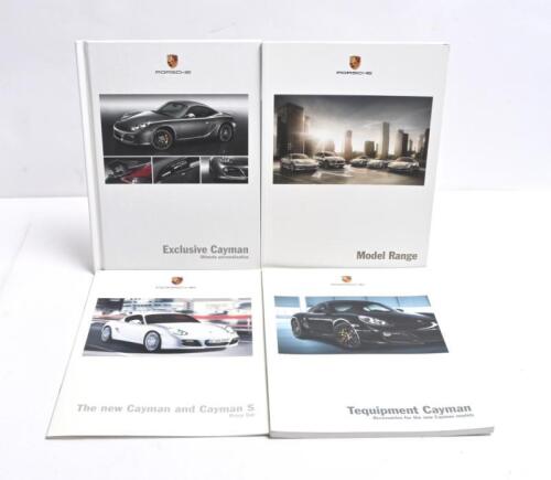 PORSCHE: Four Porsche Cayman sales brochures. 2011 Model Range brochure & Cayman Personalisation, Accessory brochures