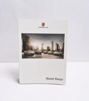 PORSCHE: Four Porsche Cayman sales brochures. 2011 Model Range brochure & Cayman Personalisation, Accessory brochures - 3