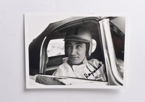 SALVADORI: A black and white picture of Roy Salvadori in a Jaguar E-Type from 1961. Roy Salvadori signature