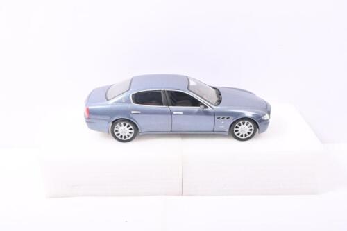 MASERATI: A 1:18 scale Hot Wheels Maserati Quattroporte in metallic grey