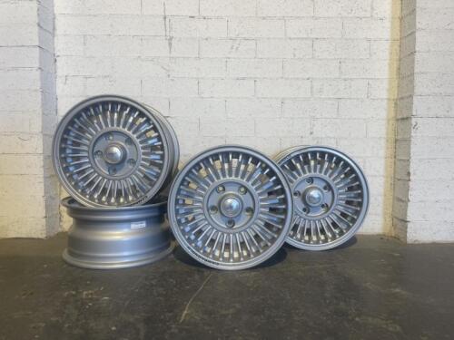 CAMPAGNOLO: A set of four NOS Campagnolo cast alloy 6.5J x 14 wheel rims [Location: Sydney]