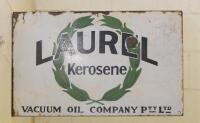 LAUREL KEROSENE: A double-sided post mounted Laurel Kerosene enamel sign -green