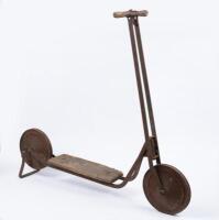 SCOOTER: An early timber and metal scooter, 83cm high