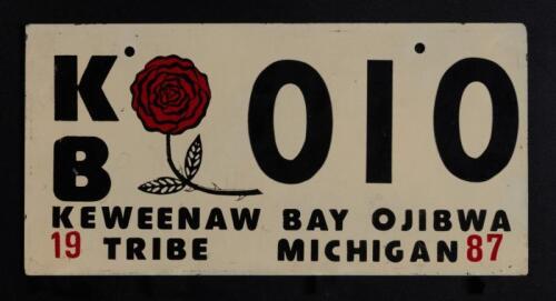KEWEENAW BAY: A 1987 keweenaw bay ojibwa tribe michigan license plate 'KB 010'