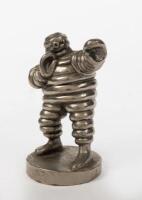 BIBENDUM: An attractive solid metal figure of an posing Michelin Bibendum with nice detail, circa 1990s.