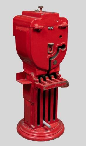 ELECTRIC STAFF: A heavy cast red 'automatic electric staff' instrument machine as used on single working lines in Victoria