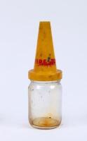 FIREZONE: A Firezone upper cylinder lubricant glass bottle with plastic top