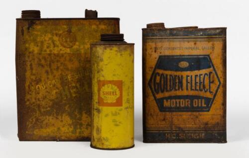 OIL TINS: Three motor oil tins including two one imperial gallon tins, early Golden Fleece & Shell as well as a later one quart Shell tin