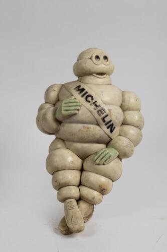 MICHELIN: A large circa 1960s original plastic Michelin seated truck mount figure, 46cm high