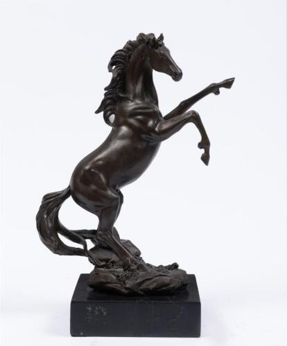 PRANCING HORSE: A bronze sculpture of a prancing horse after the original work by Antoine Louis Barye