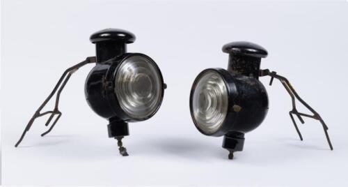 CARBIDE LAMPS: A excellent pair of carbide headlamps, both complete with bracket.