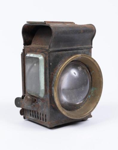 KEROSENE LAMP: A small handheld kerosene lamp, convex lense, with bevelled edged glass.