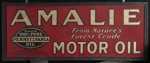 AMALIE: A excellent original tin Amalie Motor Oil sign with early 'From Nature's Finest Crude' slogan. Sign mounted in a wooden frame. 123cm wide, 50cm high