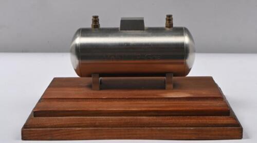 MOBIL: A steel replica of a 'LP-Gas' vessel in the form of a desk piece. Desk piece marks the installation of Mobil's 500th LP-Gas vessel in January 1995
