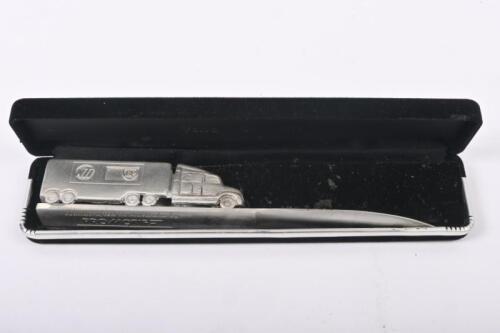 BP: A pewter letter opener in the form of a NTI, BP Volvo truck
