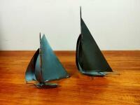 YACHTS: Two metal stylised yachts at full sail