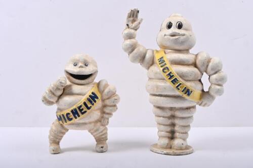 MICHELIN: Two modern reproduction cast Michelin bibendums including small seated compressor figure as well as standing moneybox