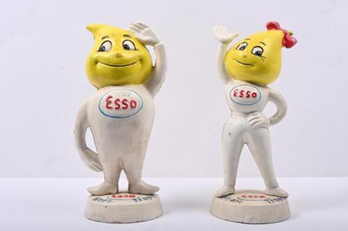 ESSO: A pair of reproduction cast Esso drip boy & girl figure money boxes on bases.