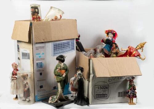 DOLLS: Over 100 various dolls in two large boxes including vintage Romanian Coop Arta Crisana Oradea dolls and various oriental style dolls.