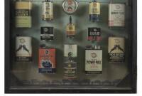 WHIZ AUTOMOTIVE: A superb scarce&nbsp;original Whiz Automotive Products salesman framed store display featuring 22 Whiz tins mounted to pictorial tin advert backing. Measures 126.5cm high, 87.5cm wide. - 3