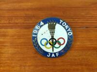 OLYMPICS: A 1964 Tokyo &lsquo;JAF&rsquo; Olympics enamelled grill badge