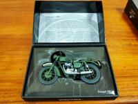 TRIUMPH: A Minichamps 1:12 scale model of a 1962 Triumph TR6 - 7