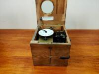 CLOCK: A horizontal tabletop boxed &lsquo;Bundy&rsquo; clock by Glenhill Brook - 11