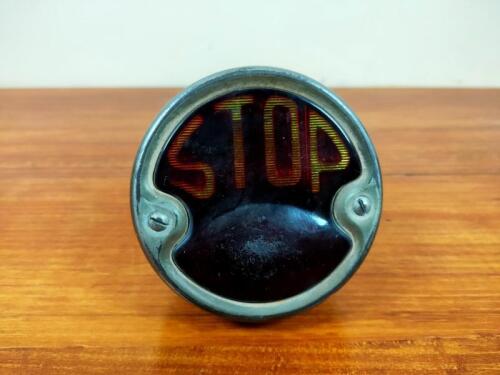 VINTAGE: A 'STOP' brake light by Brown Bi-Lite