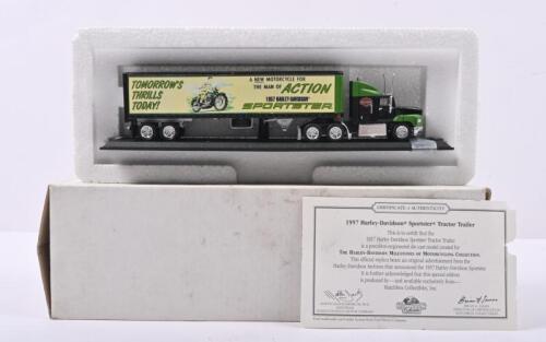 PETERBILT: A MATCHBOX 1:100 scale Peterbilt cab and trailer in 'HARLEY-DAVIDSON' livery (CCY02/HA-M). Featuring the original advertisement announcing the 1957 Harley-Davidson Sportster
