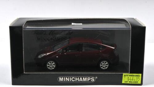 TOYOTA: A 1:43 scale MINICHAMPS Toyota Prius. One of 1,344 pieces