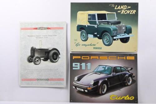 SIGNS: Three modern reproduction tin signs including Land Rover, Porsche 911 Turbo and Ronaldson Tippett, 41cm wide, 30cm high.