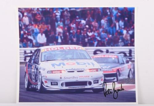 BROCK: A colour picture of Peter Brock racing a Holden VS Commodore in 'Mobil' livery. Peter Brock signature