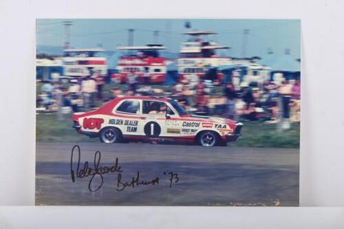 BROCK: A colour image of Peter Brock racing a Holden Dealer Team Holden Torana GTR-XU-1 during 1973 Bathurst. Image signed by Peter Brock in black
