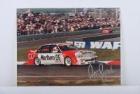 BROCK: A colour image on photographic paper of the HDT VK Holden Commodore as raced by Peter Brock and Larry Perkins at Mt. Panorama, Bathurst. Image signed by Peter Brock