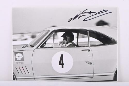 BEECHEY: A black and white image of Norm Beechey driving the HT Monaro. Image signed by Norm Beechey