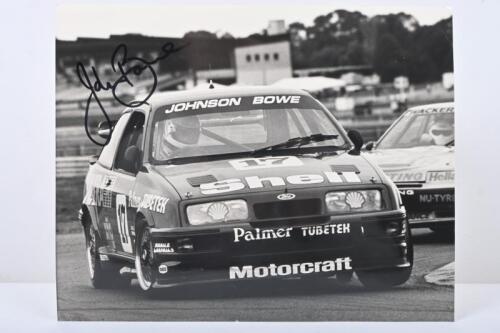 BOWE: A black and white picture of John Bowe racing the Shell Ford Sierra Cosworth. John Bowe signature