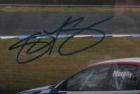 MURPHY: A colour image of Greg Murphy racing the K-Mart Racing Team VY Commodore at Eastern Creek Raceway, 2004. Greg Murphy signature - 2