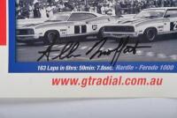 MOFFAT: A 'GT RADIAL TYRES' promotional poster featuring Allan Moffat and his Ford winning Hardie-Ferodo 500 race cars. Allan Moffat signature - 2