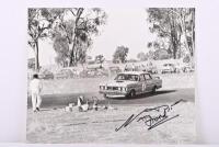 BEECHEY: A black and white image on photographic paper of Norm Beechey racing a 1971 Ford Falcon XY GT HO Phase 3 at Winton, 1972. Norm Beechey signature